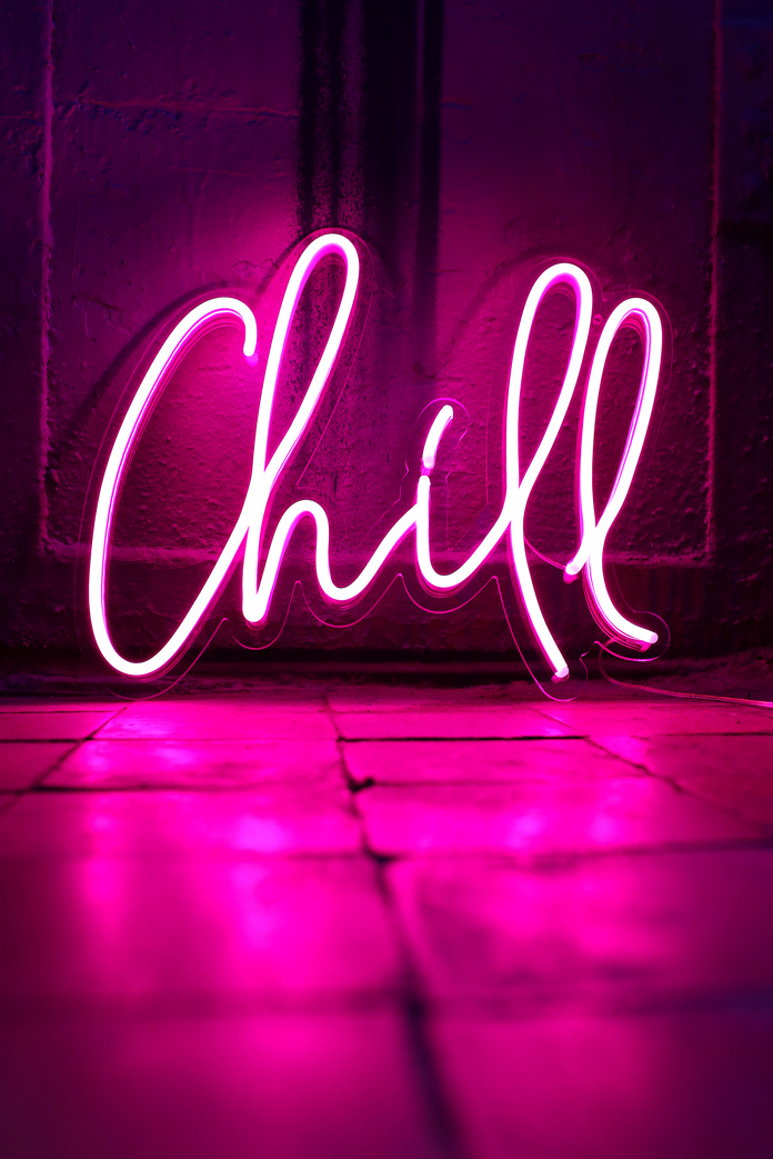 Pink neon sign chill. Trendy style.